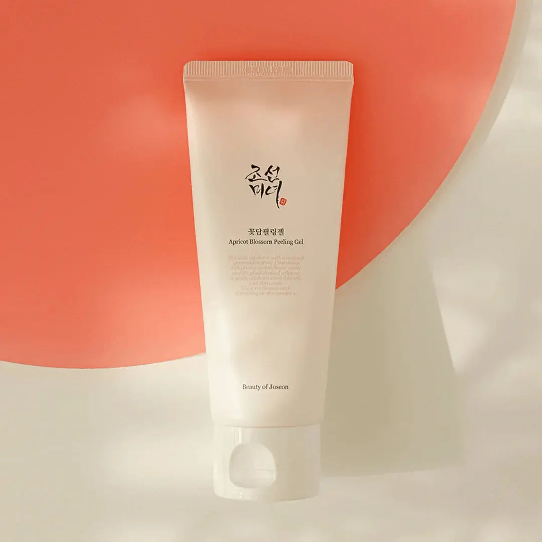 Beauty of Joseon Apricot Blossom Peeling Gel, tube voor een oranje cirkel