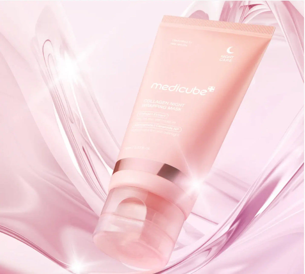 Medicube Collagen Night Wrapping Mask, tube tussen roze golvende vormen