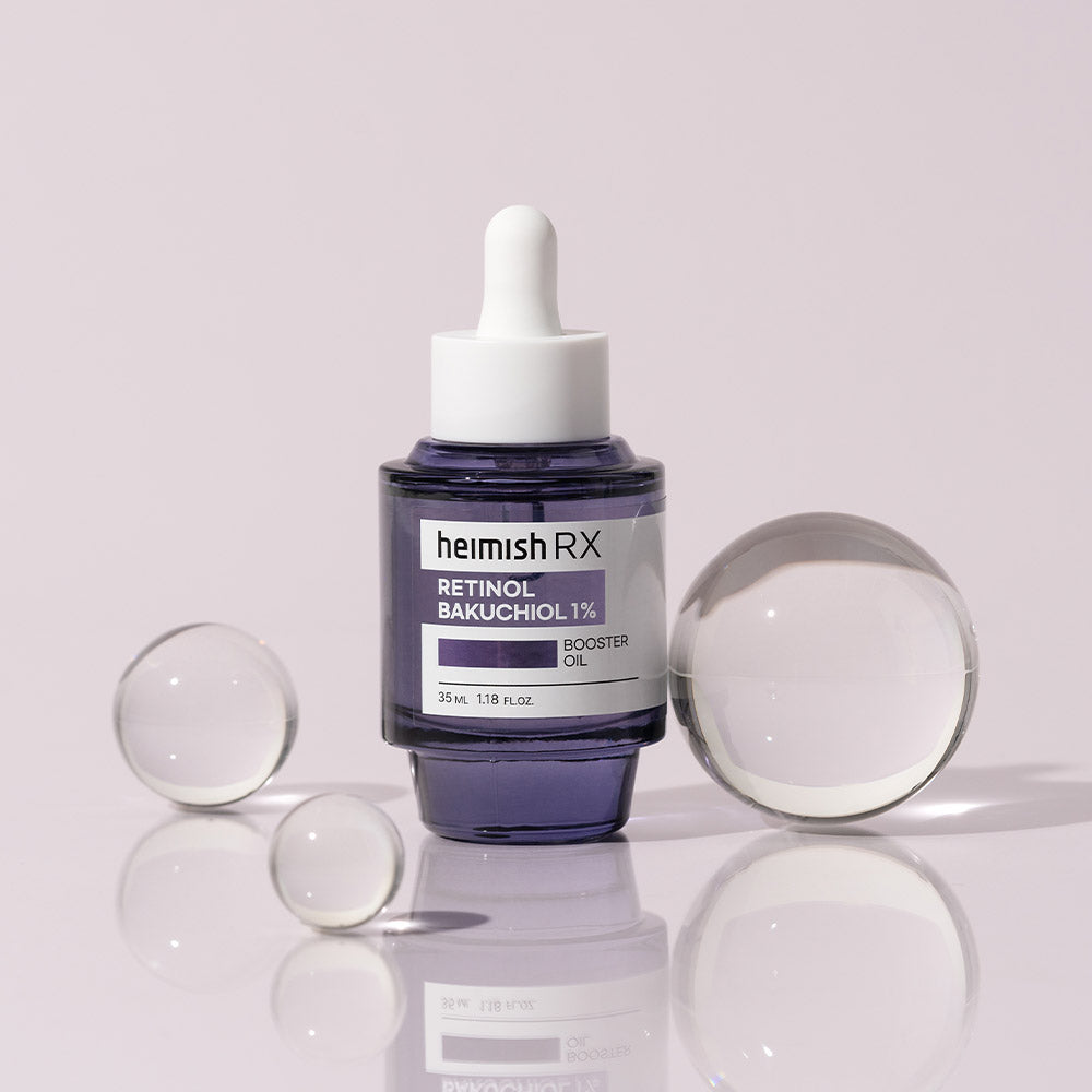 heimish Rx Retinol Bakuchiol Booster Oil 35ml met glazen bollen op lila achtergrond