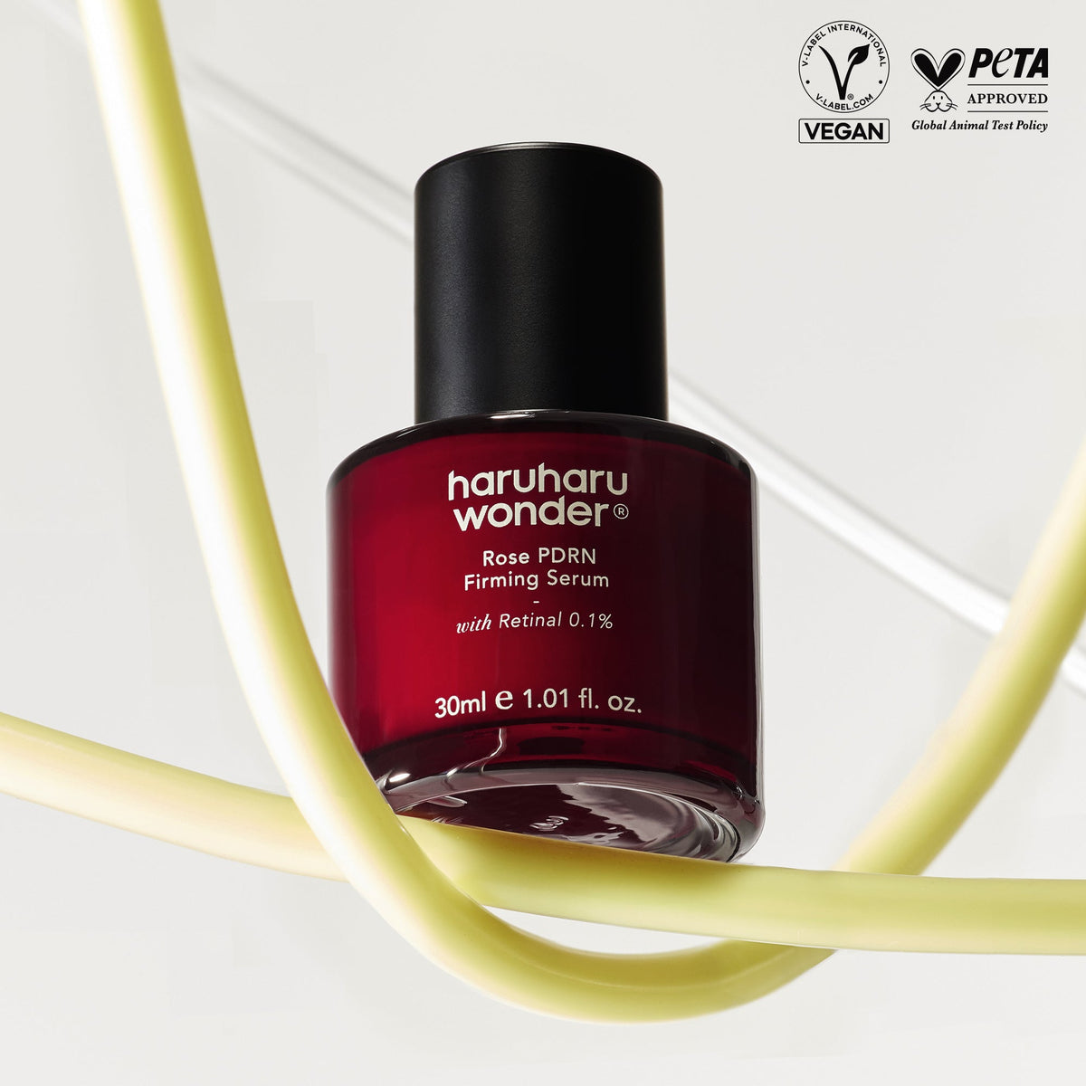 Haruharu Wonder Rose PDRN Firming Serum, vegan en PETA-gecertificeerd, op gele achtergrond