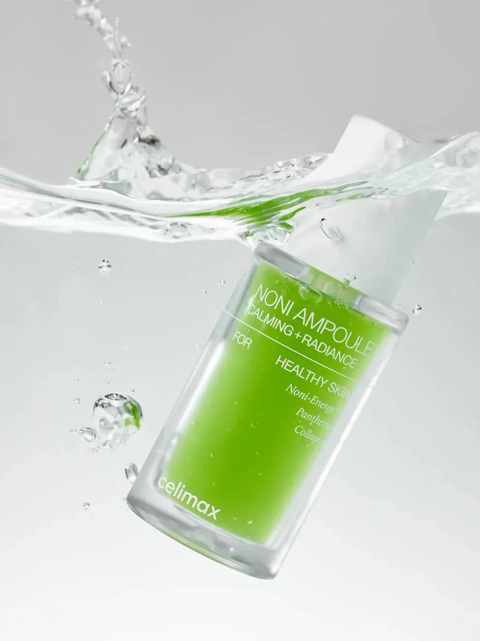Celimax The Real Noni Energy Ampoule, flacon in opspattend water