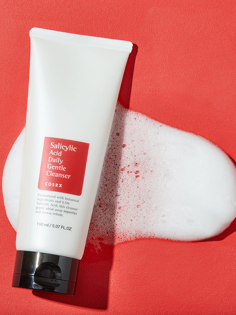 COSRX Salicylic Acid Daily Gentle Cleanser, liggende tube met schuim
