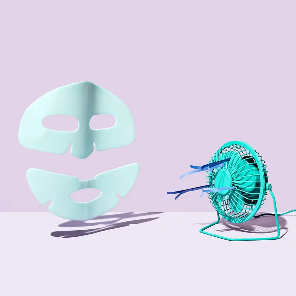 Dr.Jart+ Cryo Rubber with Soothing Allantoin, uitgevouwen groen masker naast een ventilatortje