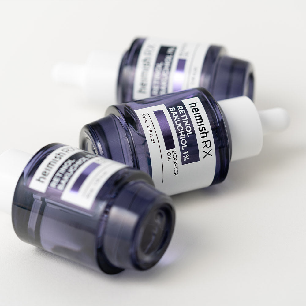 Twee flesjes heimish Rx Retinol Bakuchiol Booster Oil 35ml liggend