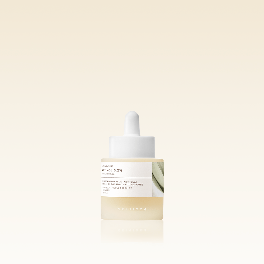 SKIN1004 Madagascar Centella Retinol 0.2 Boosting Shot Ampoule 30ml, flesje met pipet op beige achtergrond