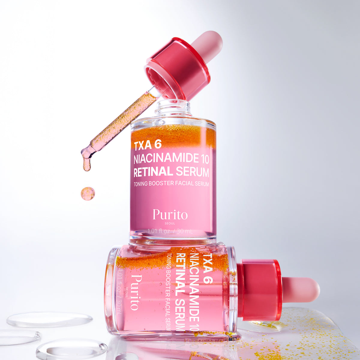 PURITO TXA 6 Niacinamide 10 Retinal Serum 30ml, twee flesjes met pipet en roze serum met retinalcapsules