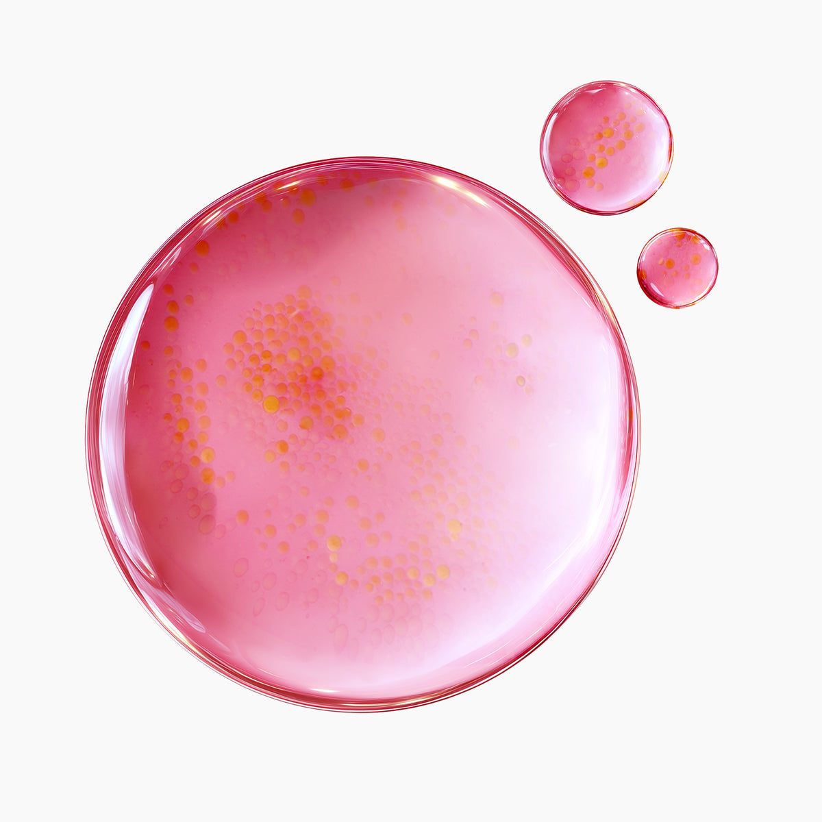 Textuur van het PURITO TXA 6 Niacinamide 10 Retinal Serum: roze druppel met gele retinalcapsules